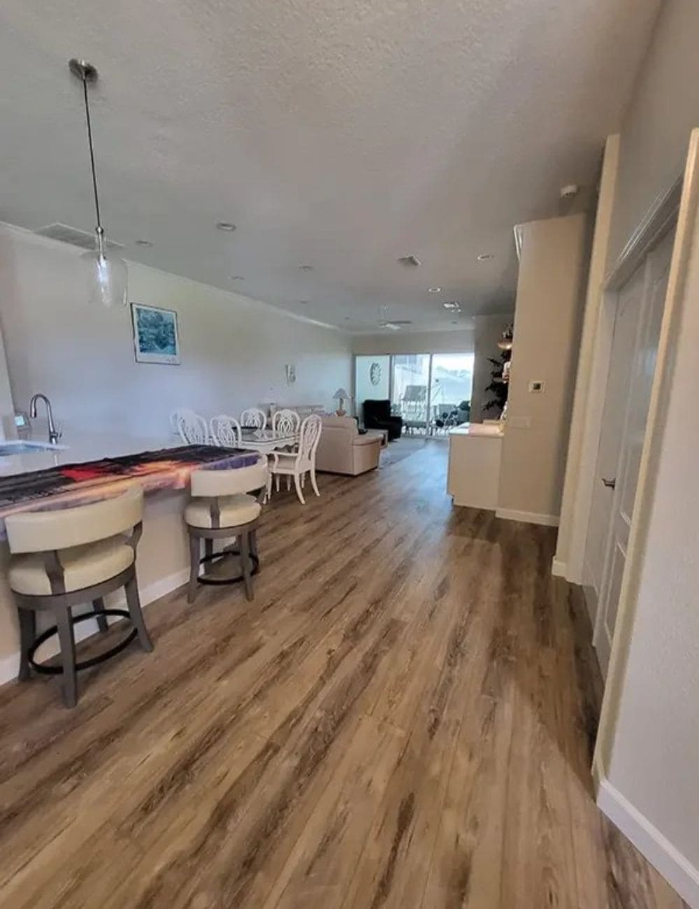 Smooth finished wall and ceiling after drywall restoration.